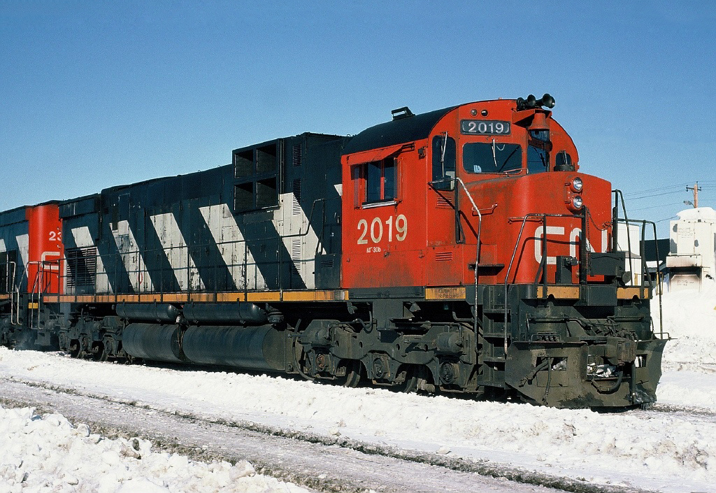 CN MLW C630M 2019 at Campbellton, New Brunswick. 02/28/1988.