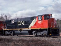 Only two CN MLW M-420Ws received this paint work, units 3536 and 3567. Photo taken at Kent Junction, N.B. May 01, 1993.