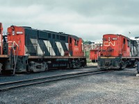 CN MLW RS-18 Nos.3669 and 3662 in Bathurst CN yard, October 05, 1982.