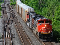 CN 8905 and CN 5671 roll this eastbound freight through the Niagara Escarpment off the Dundas Subdivision and onto the Oakville Subdivision at Bayview Junction.