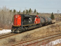 Eastbound CN 402 with SD70M-2 No.8921 working long Hood forward with only three cars in tow.