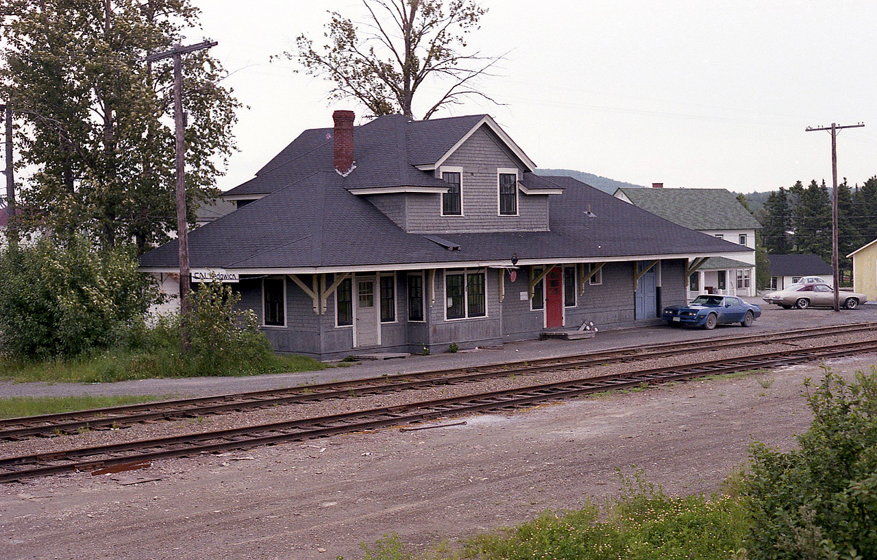 Another in my personal 'station series'; not many are as obscure as this one.  The CN St. Quentin Sub from Campbellton west to Saint Leonard was abandoned back in 1989, leaving this and a couple of other stations homeless. Even in 1981 when I was snooping out the area, the weeds were beginning to take charge of the line in many localities. One would think there was never much "action" around Kedgwick, save for perhaps logging and lumber business. Back then the population was only 1200 or so and has been on the decline ever since. I'm not sure of the status of this station today, but it was used as a Food Co-op about 20 yrs ago.