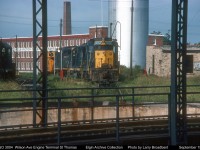   C&O GP30 3004 viewed through the Turntable at the Wilson Ave Engine Terminal  September 1977