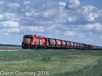 Rolling along the prairie on the Carman Sub the Carman Turn has brightened up what was a slow day on the railway. The Carman Turn seldom ran to Carman and today only went as far as the Cargill elevator in Elm Creek. 