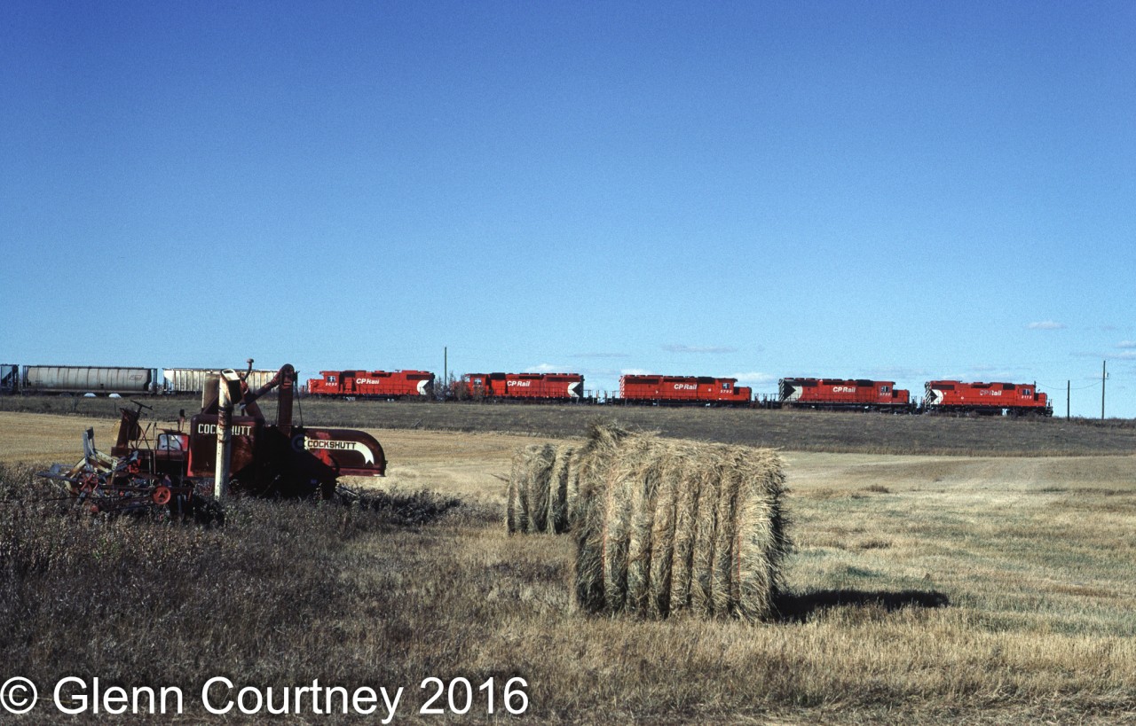 CP Rail GP38-2 3112 leads a quartet of SD40-2s eastbound from Minnedosa with a grain train. Ameer was the first siding east of Minnedosa.