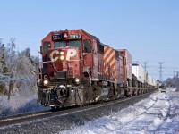 Reflecting back on the ice storm of 2013, which caused havoc on most of southern Ontario, including the railroads. Here's the westbound eXpressway at the west end of Cherrywood running about 8 hours late.