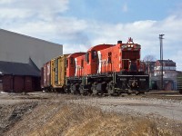 Two CP MLW RS-23 No.8034 and 8027, transferring cars to CN yard at Saint John, New Brunswick April 1990.