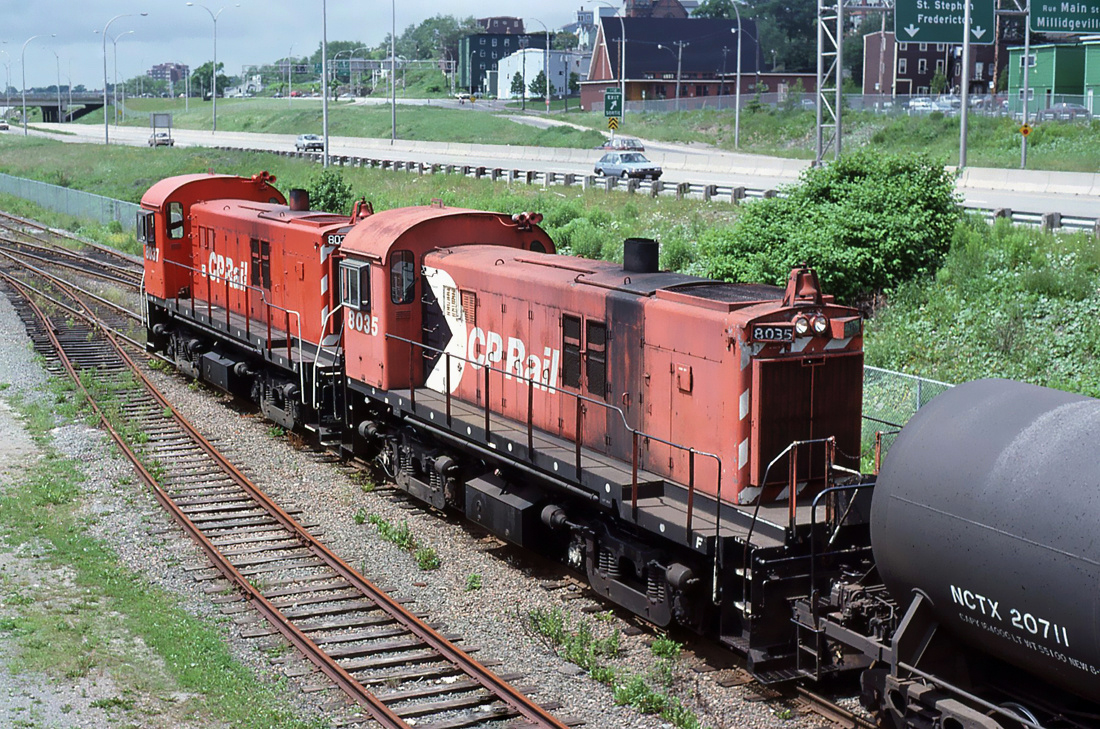 CP Rail MLW RS-23 Nos.8035 and 8037 on a Tansfer run in CN yard Saint John N.B. June 24, 1989.