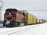 Westbound CP container train from Montreal, with a single GE AC4400CW 9606 near Smiths Falls, Ontario February 03, 2005. 
