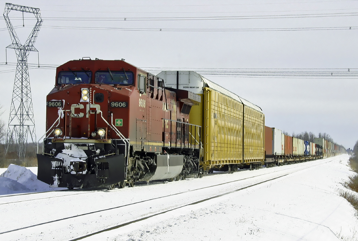 Westbound CP container train from Montreal, with a single GE AC4400CW 9606 near Smiths Falls, Ontario February 03, 2005.