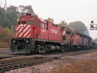 I've not recorded the identity this train but it obviously looks like it is the Starlite, heading to Hamilton from Toronto on its usual afternoon time. But the power is not what I was used to seeing. CP 4220, 5021 and C&O 3527 instead of a TH&B unit or two in consist. Nice to see despite the dull fall weather.