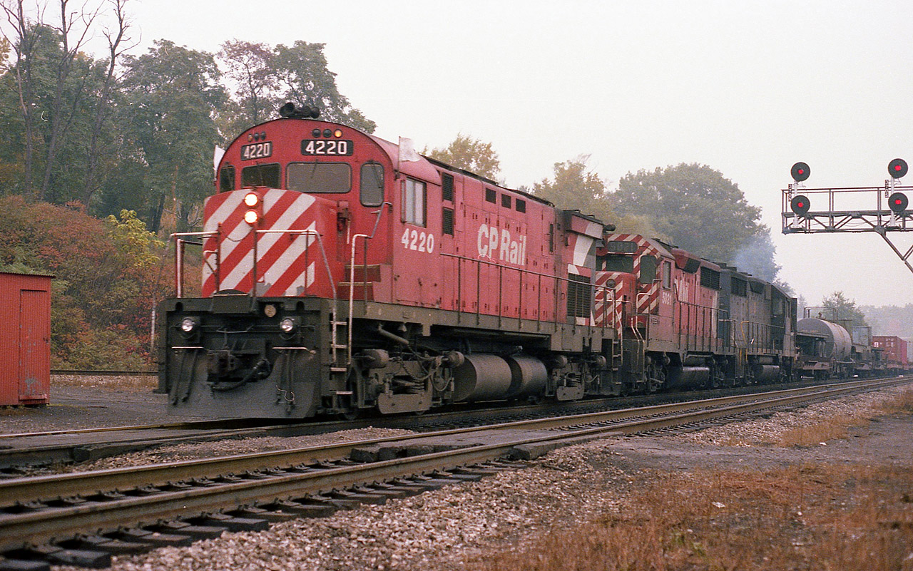 I've not recorded the identity this train but it obviously looks like it is the Starlite, heading to Hamilton from Toronto on its usual afternoon time. But the power is not what I was used to seeing. CP 4220, 5021 and C&O 3527 instead of a TH&B unit or two in consist. Nice to see despite the dull fall weather.