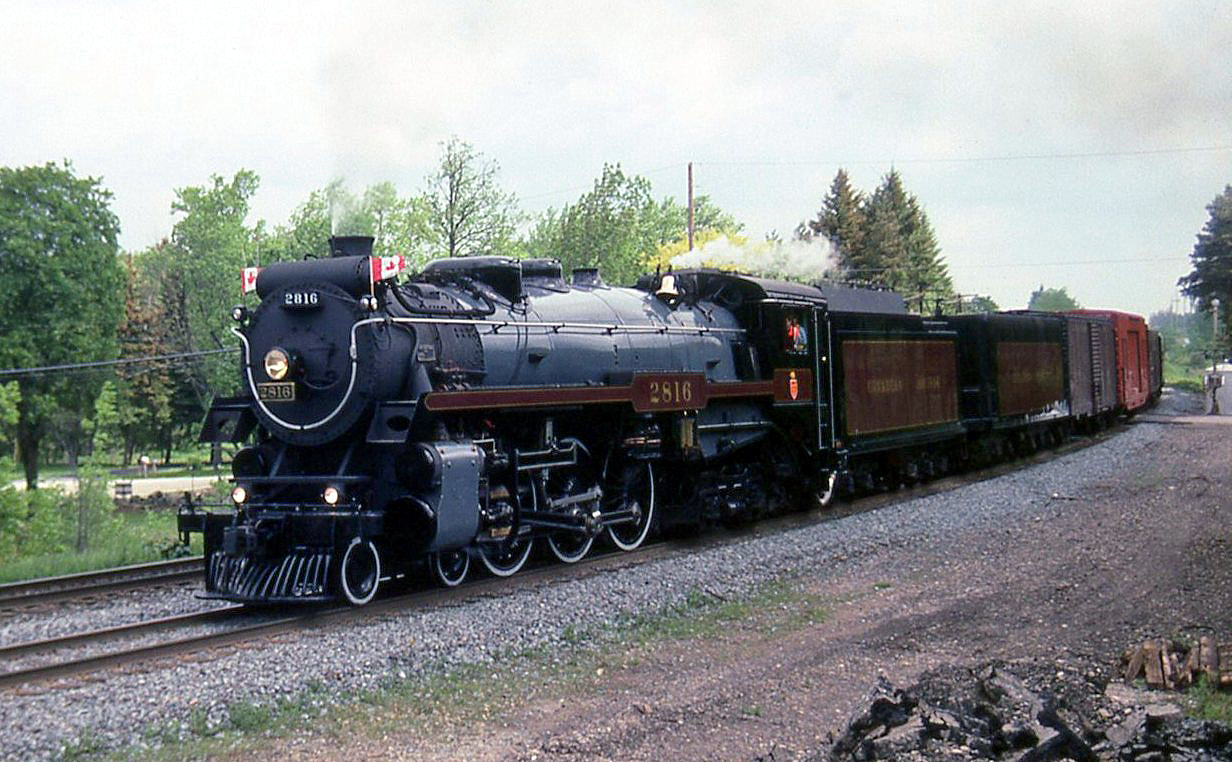 CP H1b Hudson 2816, completely overhauled and now christened the "Empress", is seen climbing the Niagara Escarpment at Appleby Line on June 9th 2003. After its overhaul and return to service under CP, 2816 came east touring the area in 2003 and 2004.