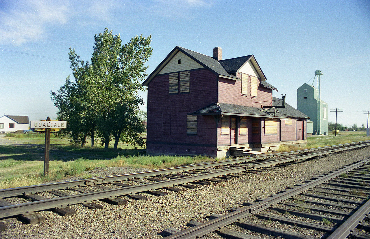 I remember the feeling that 'I got there just in time' way back in 1976 when I showed up at Coaldale, which was once a very sleepy town compared to today. Being in close proximity to Lethbridge was a good enough excuse to board up and demolish this old station. (a large modern on existed in Lethbridge) The early to mid-70s was a period of a 'demo-frenzy' as both CN and CP tore down these outdated structures a lot faster than I could ever hope to photograph them.