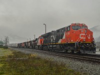 The crew for CN 571 goes to work putting the northbound "BCR" train together with the help of a months-old GE Tier 4 locomotive.