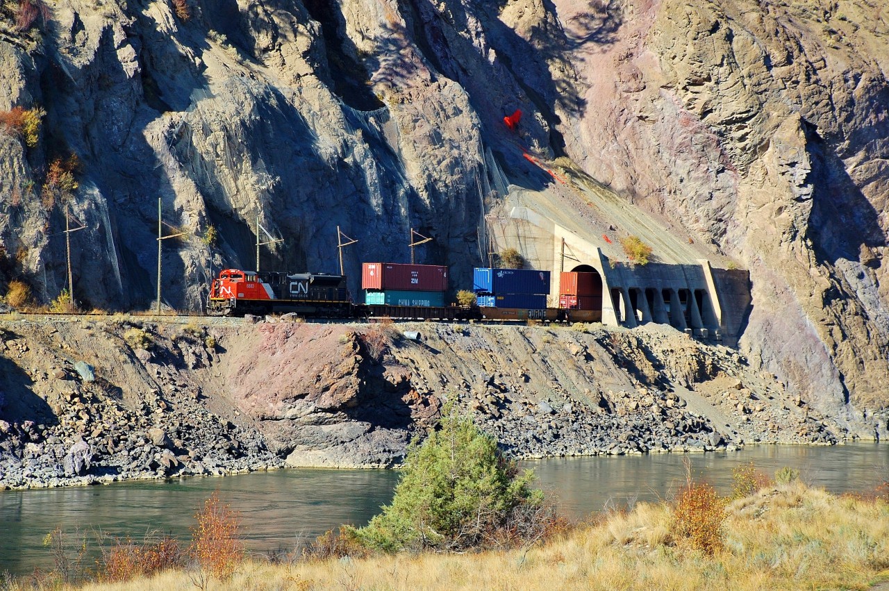 CN 8883 emerges from the Skoonka sheds leading a westbound Intermodal on it's way towards Deltaport on the west coast.