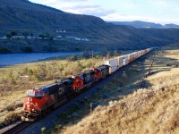 Early morning in Ashcroft as CN nos.2835,5476 & 2429 bring an eastbound Intermodal alongside the 
Thompson River.