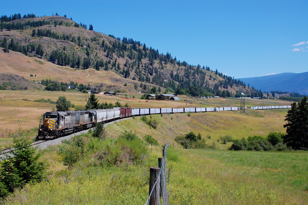 GTW nos.5946&5945 are in charge of this local freight that is seen crossing Grandview Flats on its way north to Kamloops.