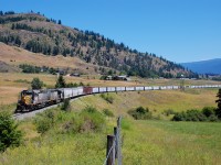 GTW nos.5946&5945 are in charge of this local freight that is seen crossing Grandview Flats on its way north to Kamloops.
