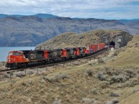 CN 5636 is leading this eastbound Intermodal out of the tunnel at Kissick and headed for Kamloops.