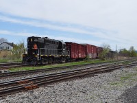 TRRY 1859 navigates through the once busy Merriton yard long hood forward after servicing the scrap yard. It'll take the Grantham Spur to various industries in St Catharines. 1859 just missed a meet with a light powered CN 523 by a minute.