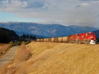 The afternoon sun is highlighting this westbound coal train as it rounds the loop at Notch Hill, led by CP 9367.