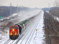 Grain train CN 878 has a solid set of 84 Saskatchewan Grain Car Corporation hoppers, along with 20 intermodal platforms on the tail end (lifted at Capreol). Power is CN 2855 at the head end and CN 3113 at the tail end.