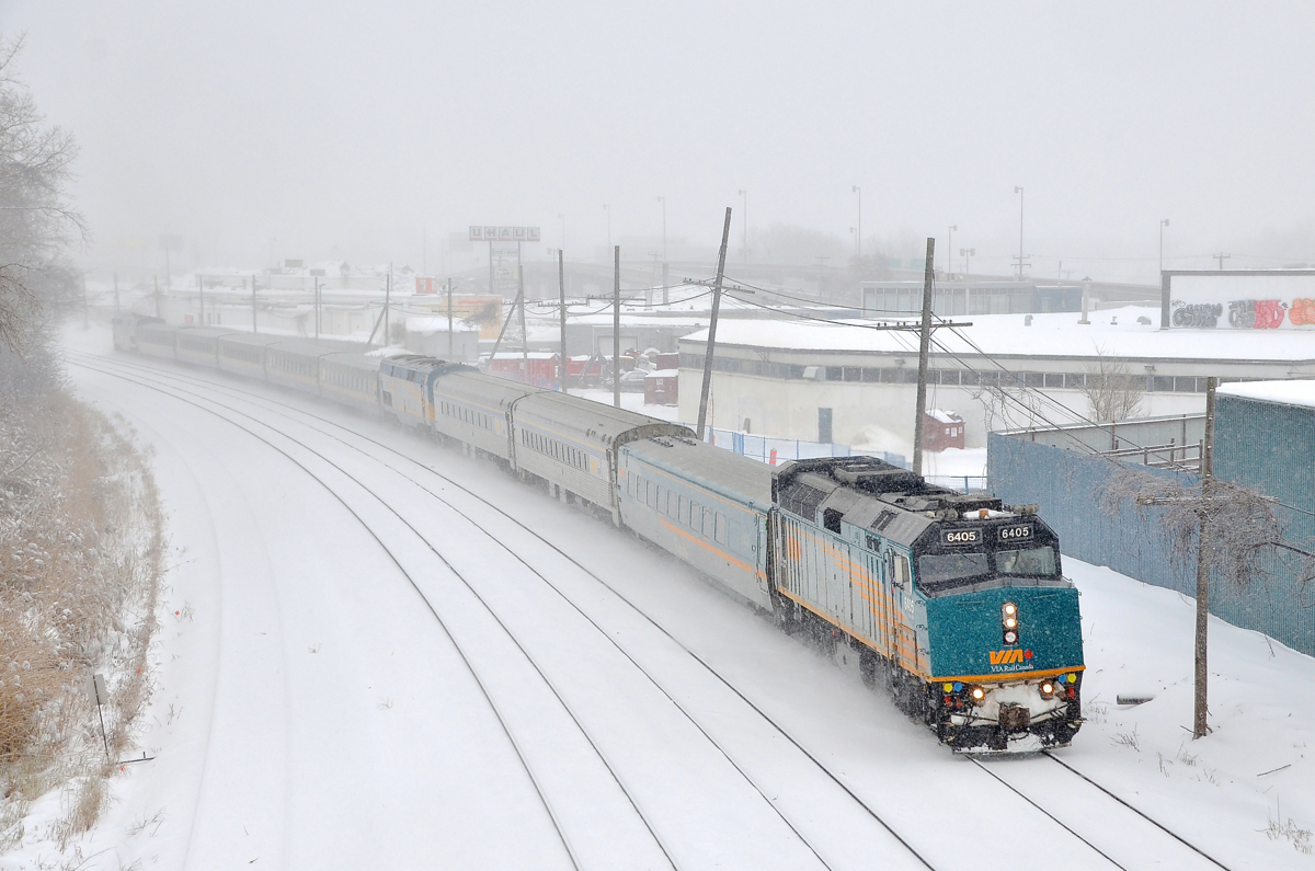 A quite late VIA 633 (it left Central Station in Montreal 100 minutes late) has VIA 6405 at the head end, an unidentified P42DC in the middle and VIA 917 at the rear. Every Sunday this train has this configuration, presumably it is an equipment move. This train terminates in Ottawa.