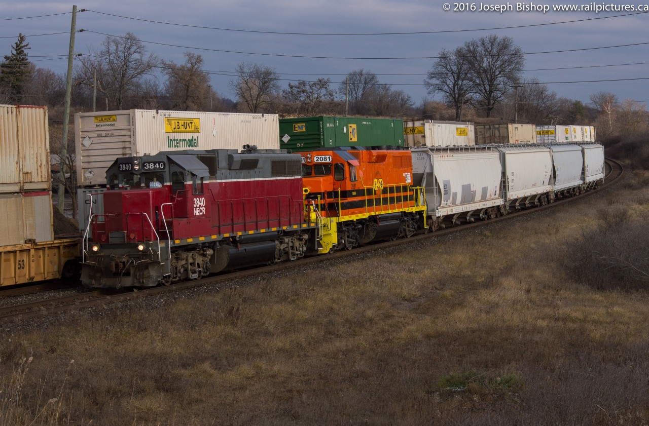 NECR 3840 and RLHH 2081 lead train 496 the Rob Smith dubbed "Ingenia Cannonball" by Garden Ave in Brantford on their way to Ingenia Polymers in downtown Brantford.  They just met CN 148 at Powerline Road and are hot on the block of CN 231.  2081 will be left in Brantford this afternoon for SOR 597 to lift tonight, RLHH 3049 is headed back to Hamilton after blowing a turbo Monday night.