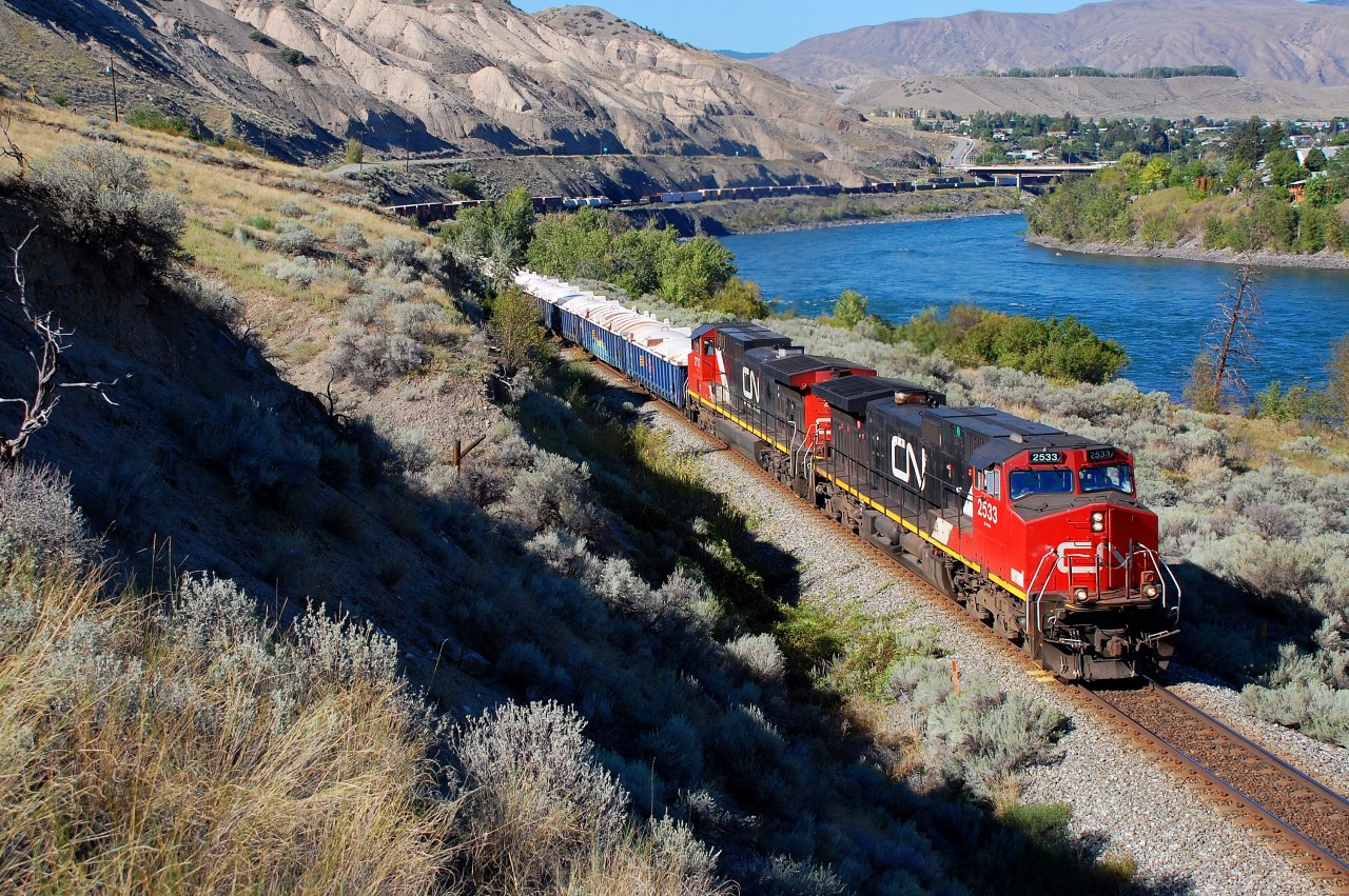 CN nos.2533&2717 are leading a westbound mixed freight out of Ashcroft on a late afternoon in August.