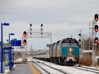 For the third year in a row, VIA Rail has run extra editions of VIA 14/15 (the <i>Ocean<i/>) with 100% Budd consists. Here VIA 15 approaches its final station stop at St-Lambert with VIA 6437, VIA 6446 & VIA 6425 leading 13 stainless steel cars.