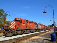 A bit over three years ago, a pair of multimarked SD40-2's (CP 6020 & CP 5874) bring a ballast train into Valois Station where it will dump ballast on the north track. At the rear is caboose CP 434957.