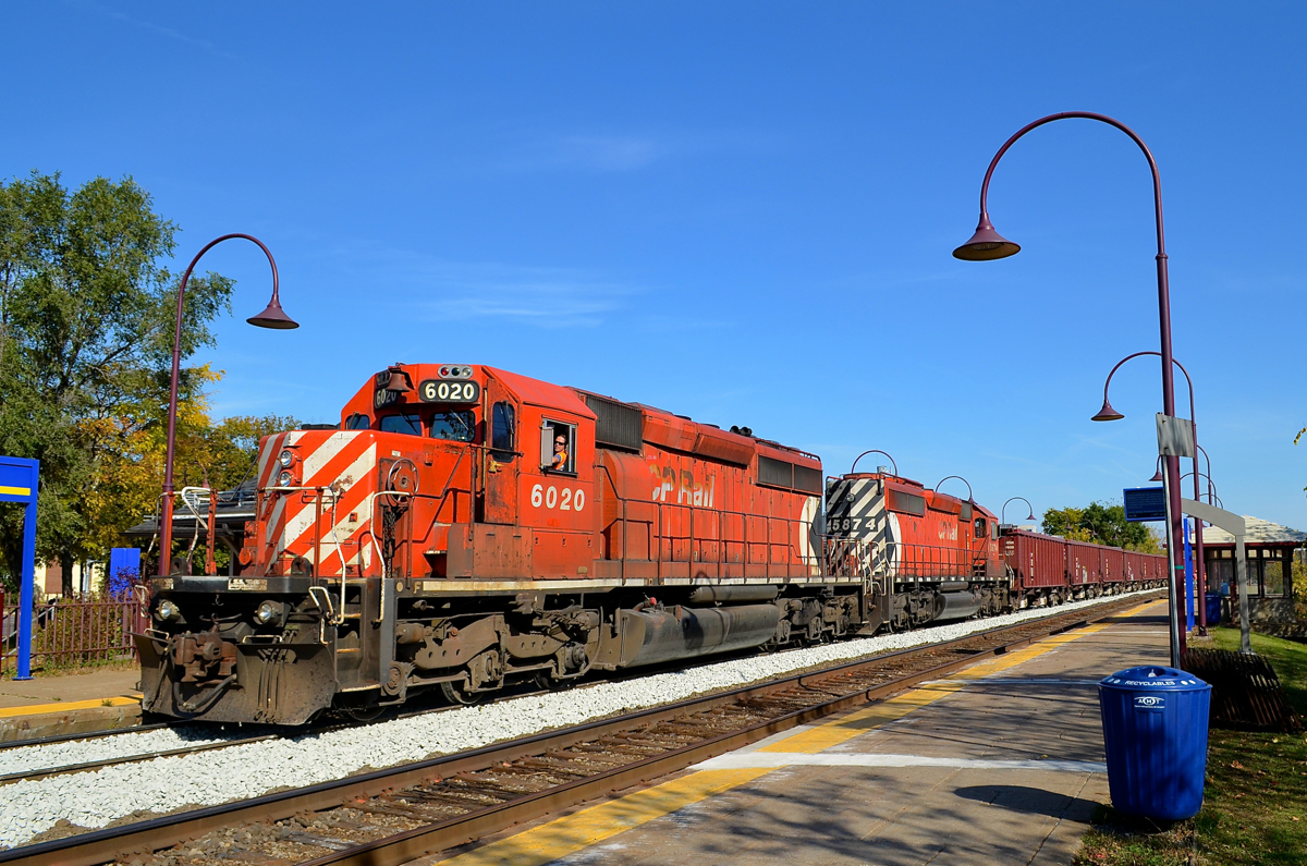 A bit over three years ago, a pair of multimarked SD40-2's (CP 6020 & CP 5874) bring a ballast train into Valois Station where it will dump ballast on the north track. At the rear is caboose CP 434957.