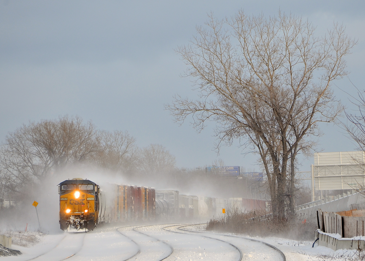 CSXT 5292 leads CN 327 as it negotiates the s-curve just east of the Dorval Station on CN's Montreal sub on a frigid afternoon.