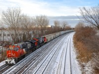 CN B730 has a whopping 205 potash cars for Saint John, New Brunswick as it approaches a crew change at Turcot West. Power is 4 GE units: CN 3025, CN 3097 with CN 2905 & CN 2950 mid-train.