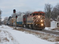 CN L509 approaches the Strathroy VIA station as it blasts through multiple crossings
