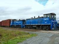 Two GMTX MP15DC 205 and 209 on CN tracks at St. Leonard, N.B. Leased by New Brunswick Southern and working on the Maine Northern Railway which is owned by the NB Southern. At St. Leonard, New Brunswick, Maine Northern Railway as industrial trackage.