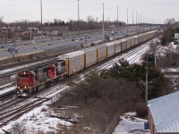 CN 373 rolls by Ajax with a pair of standard cabs hauling 4,800' of traffic for Toronto.