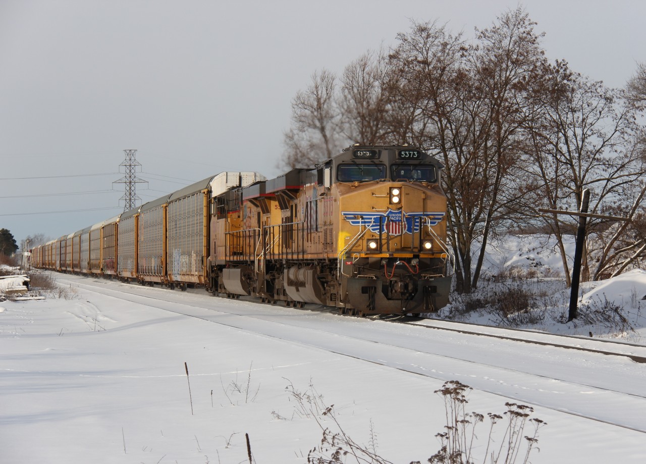UP 5573 and UP 5547 lead CP 242 as they race eastbound out of Wolverton on the morning of New Year's Eve 2016. Happy New Year to all on here and your families and I wish everyone a healthy and prosperous 2017! (Time - 09:39)