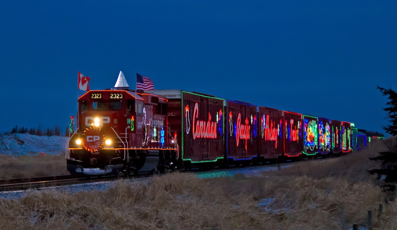 CP's 2016 Holiday Train enters Scotford Yard headed by GP20C-ECO CP 2323.  The train was in the yard to turn on the wye and then head back to Josephburg for its first stop and performance of the night.