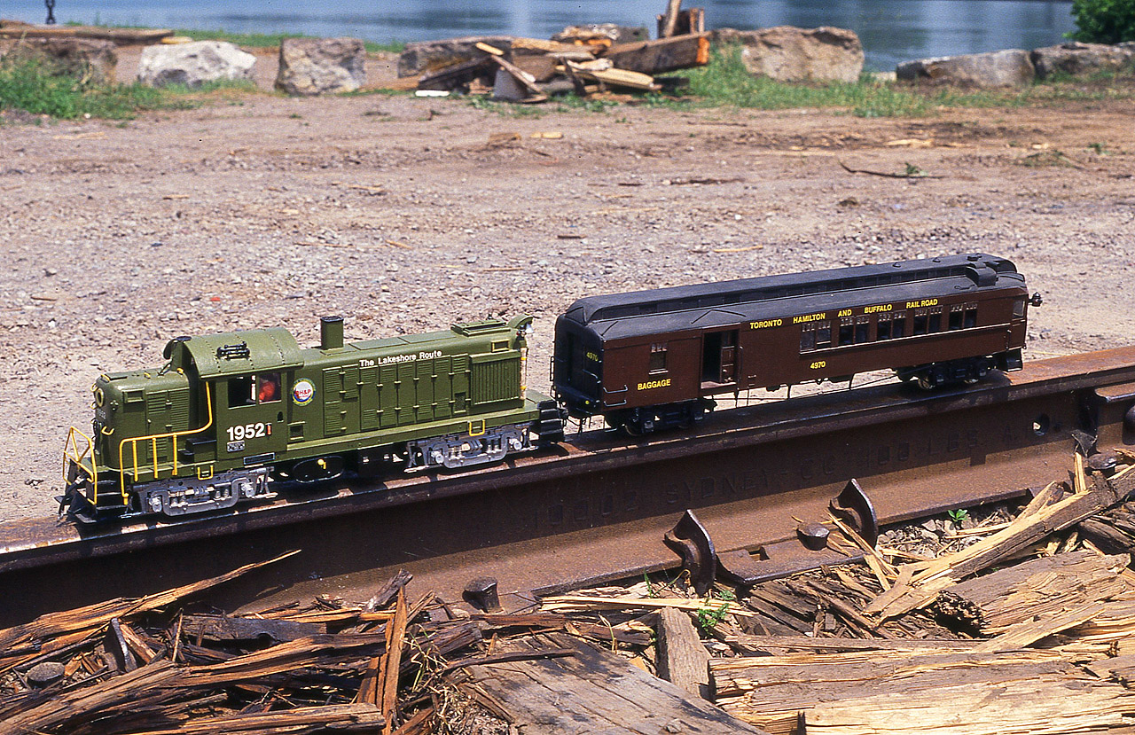 Not On The Wheel Report: Might as well finish off 2016 with something a little different. Before you say "What the.....", the story behind this is as follows:  I was at the start up festivities of the Port Colborne Harbour Railway on one hot and sticky July morning (along with several others who contribute to this site), in order to do an article with photos for Railpace magazine. This was the Official Opening Day for the railroad and it brought out a fair number of local citizens and hobbyists to the location close by the old CN railroad station next to the canal. As well, CHCH was there to cover this 'historic' event. One of the local modellers found this a great opportunity to show his work, and as you can see he put in a dedicated effort. Definitely worthy of a photo. In order to showcase it correctly, well, we needed some track. And this was the best we could do. The PCHR mainline. I get to wondering if the modeller is a lurker of Railpictures.ca, as I never did get his name, and coming up to 20 years later he might see this image and identify himself.
