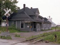 Another of those old interior New Brunswick railroad stations, most of which are long gone. As is this one. The CN subdivision of the same name was taken up in 1989 and as far as I know the station succumbed as well. Whether it met the demo crew or perished by fire I have no idea. Would love to hear from anyone in the know.