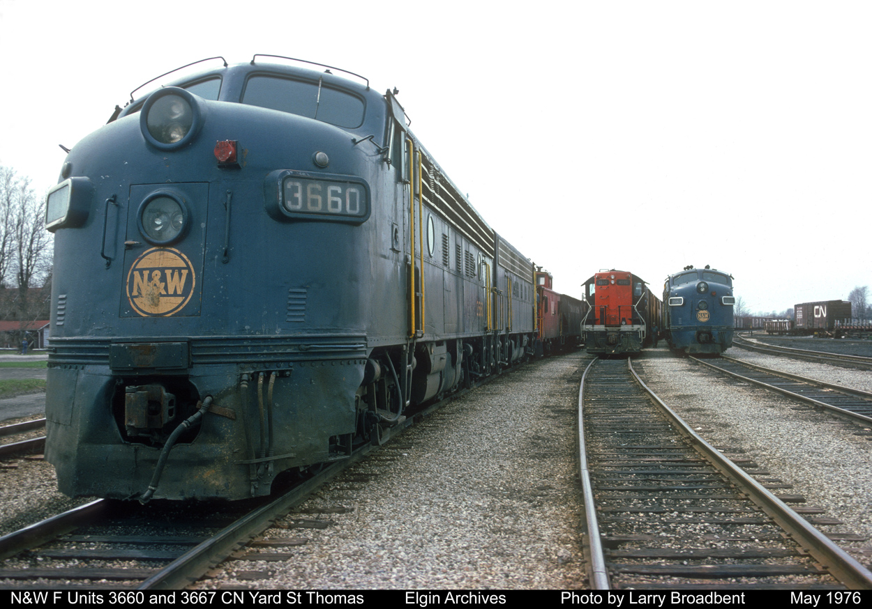 Four N&W F7a's (3660 3667) and a CN GP9 4590 await their next assignments CN Yard St Thomas May 1976