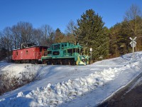 Another year of Train operations comes to a close on the PSTR. L2 brings Santa's Caboose across Roberts Line heading back to the yard in Port Stanley.