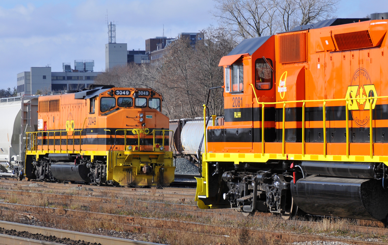 SOR's newest and oldest pumpkins meet in the yard at Brantford. 2081 leading 598, and 3049 awaiting transportation back to Hamilton for repairs