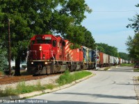<b>My oldies again </b> On track now abandoned, Port Lambton Ontario sees an 83 car train running alongside MacDonald Street with four locomotives back in August 2005. The CP Locomotives were run-thru power as CP took the train from Chatham to Detroit (CP 525/524) where CSX would resume the journey to Toledo over their own rails. D725 ran six days a week (Monday-Saturday) and began their day in Sarnia at 0500. The two CSX Locomotives would be dropped off in Chatham for a Blenheim turn (Chatham to Blenheim, back to Sarnia) which ran two days a week (Tues/Thurs) and I did take the time to follow. <br><br>Question for those who know:<br>a) What happened to CP 6059 and 9019?
