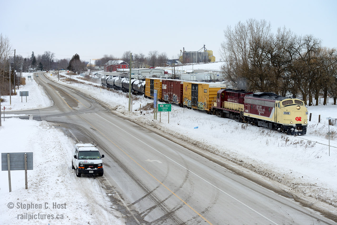 When they look this good - you can't go wrong with the Ontario Southland Railway. OSR's St. Thomas job is about to duck under the 401 at Putnam, Ontario with cars for Messenger Freight Systems and propane cars for interchange with CN in St. Thomas.