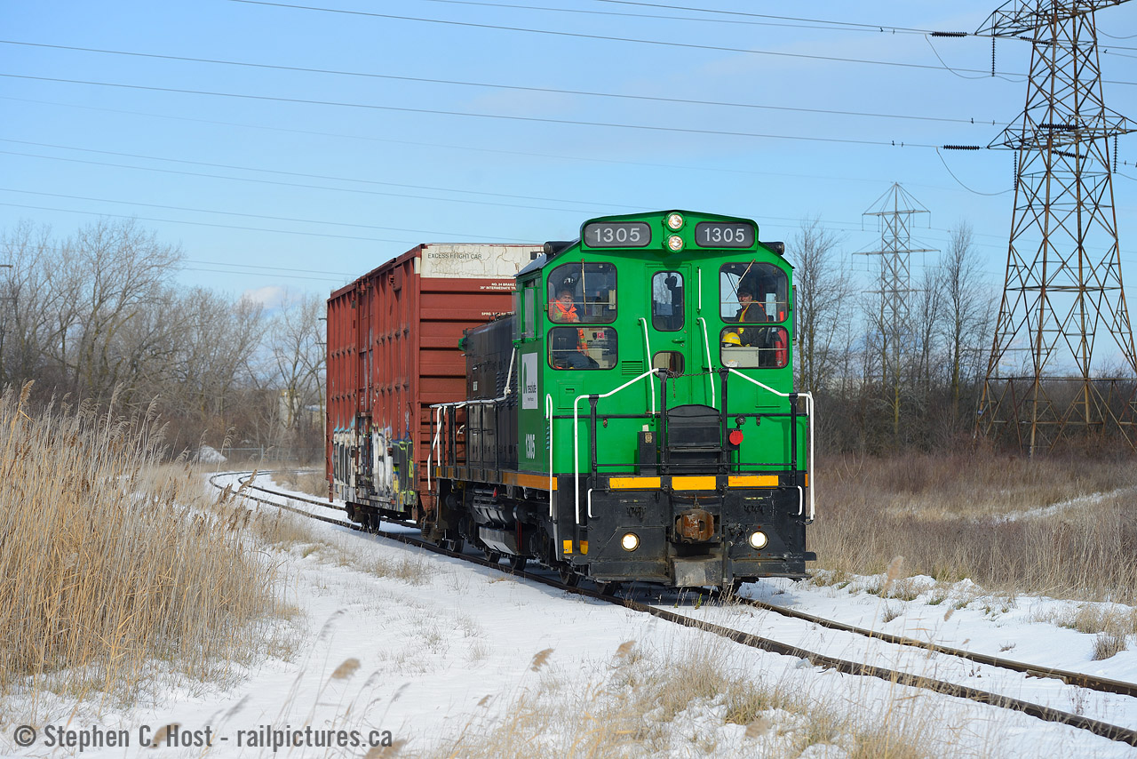 The elusive Resolute Forest Products switcher, ex CN 1305 (last reported as DESX 1305) makes its infrequent, two mile run to a yard at the end of the CN Thorold spur. I had known about this operation for a while, and had made four attempts over the last 3 years to 'catch' it - just by chance - they run on an infrequent and seemingly random schedule - and this time I got lucky. What the line lacks in scenery is made up for in, well, variety - not many Green switchers out there in this Country. With only a single car - I kind of wonder how much longer this operation will last. The nearby Georgia-Pacific plant was idled in 2014 and the also nearby Hayes-Dana frame plant has been idle since 2008. This spur was once very very busy - and not to mention the Pulpwood trains that were unloaded here - long gone - see an Arnold Mooney photo in suggested photos below.