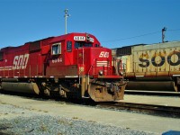 Red SOO SD60 is parked outside of Plant 2 beside an older white SOO Line sister.