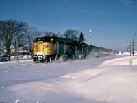 Eastbound VIA Rail train 14 The Ocean with MLW FPA-4 6786 and FPB-4 6864 in Eastern New Brunswick. January 07, 1985.